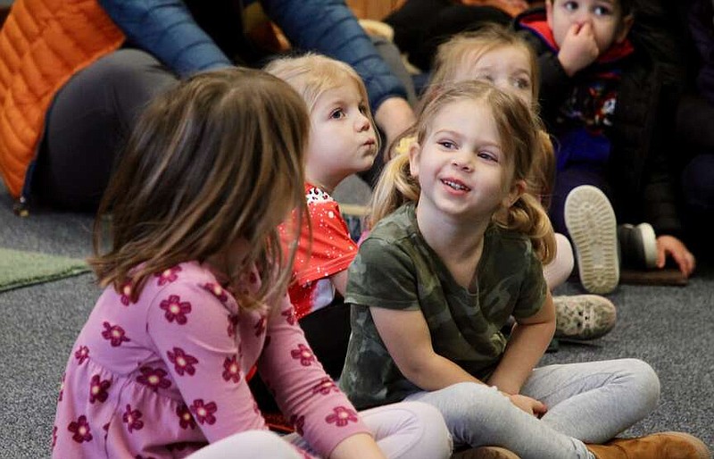 Alexa Pfeiffer/News Tribune photo: 
Gentree Tindle talks to Olivia Lehman during the wildlife puppet show “Let's Cuddle Up, Please” held Saturday, Jan. 20, 2024, at the Runge Nature Center in Jefferson City.