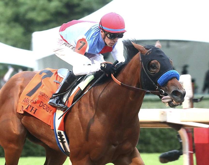 Muth, under regular rider Juan Hernandez, gives Hall of Fame trainer Bob Baffert his record-tying fifth Arkansas Derby victory before an estimated crowd of 60,000 Saturday at Oaklawn. (Submitted photo courtesy of Coady Photography)