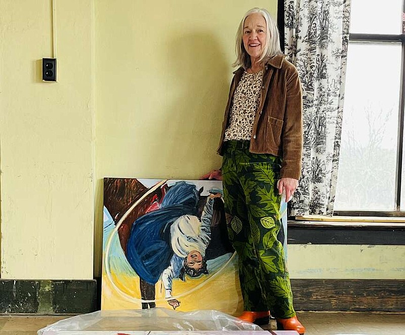 Katherine Strause is shown with some of the works that will be featured in "Fierce Women: Paintings by Katherine Strause," which opens today at the Windgate Gallery of Art and Design at the University of Arkansas-Fort Smith. (Arkansas Democrat-Gazette/Sean Clancy)