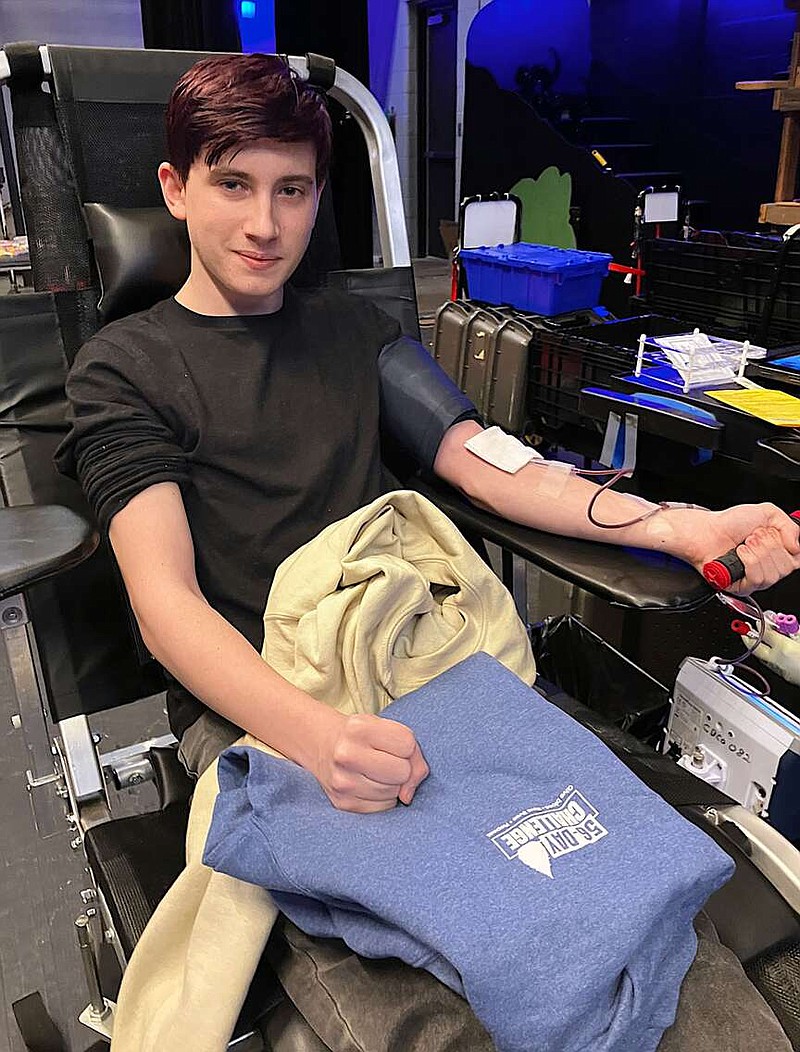 Randy Moll/Westside Eagle Observer
Gentry junior Mikey Hassett was among those who gave blood at a Community Blood Center of the Ozarks blood drive held at Gentry High School on Jan. 24. In recognition for hosting blood drives, CBCO gives a scholarship to a graduating senior.