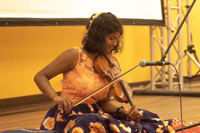 According to Ra-Ve founder Srividya Venkatasubramanya, Carnatic music “uses a certain way of blending the notes that is called gamakam, which brings out the emotions in the music. It is played without reading any music sheets. Indian music is based on elaborating certain scales or ragas in certain ways that have to be learned from a guru over many years.” At the Yuva Utsav Feb. 10, Matangi Arun and Medhansh Sankaran will play Carnatic violin, and Vedanth Attili will play Mridangam (percussion).

(Courtesy Photos/Ra-Ve)