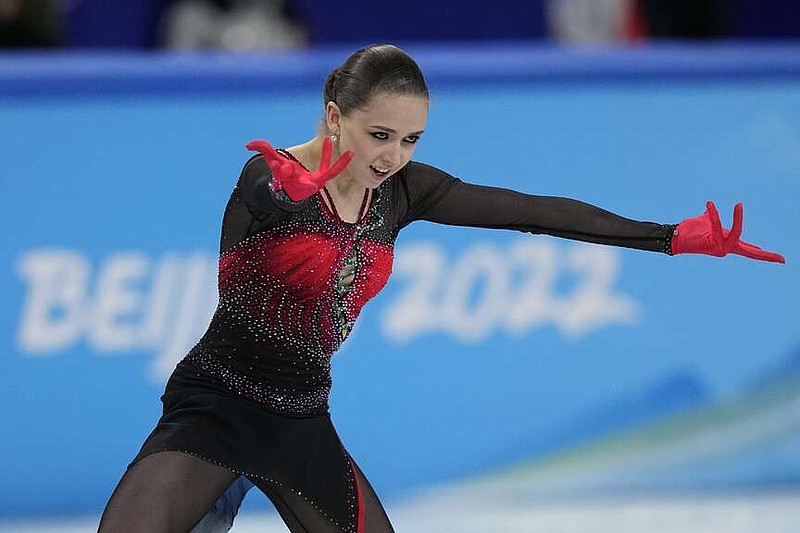 FILE - Kamila Valieva, of the Russian Olympic Committee, competes in the women's team free skate program during the figure skating competition at the 2022 Winter Olympics, Monday, Feb. 7, 2022, in Beijing. Russian figure skater Kamila Valieva has been disqualified from the 2022 Beijing Olympics. The verdict from the Court of Arbitration for Sport comes almost two years after Valieva's doping case caused turmoil at the Beijing Games.  (AP Photo/David J. Phillip, File)