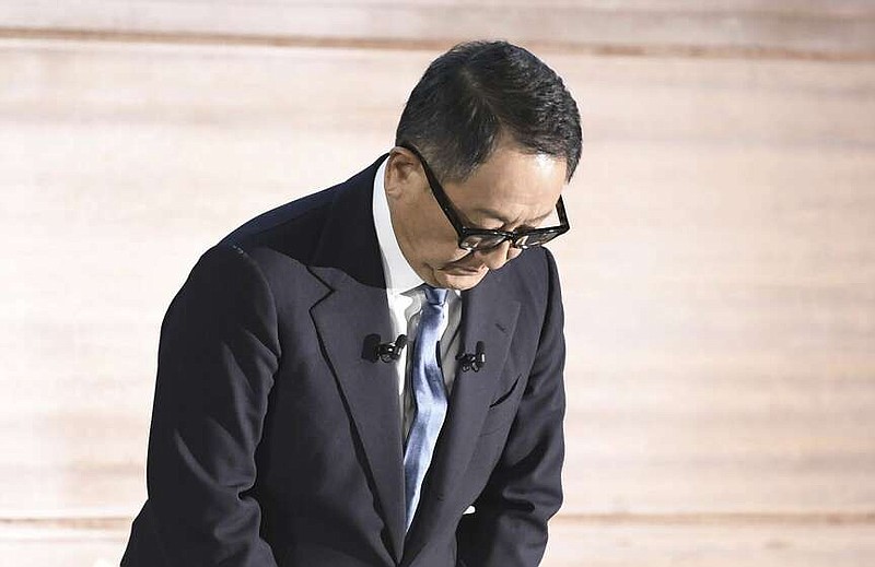 Toyota Chairman Akio Toyoda bows during a news conference in Nagoya, central Japan, Tuesday, Jan. 30, 2024. Hours after Japanese transport officials raided the plant of a Toyota group company on Tuesday to investigate cheating on engine testing, Toyoda vowed to steer the company out of scandal and ensure the Japanese automaker sticks to “making good cars.” (Kyodo News via AP)