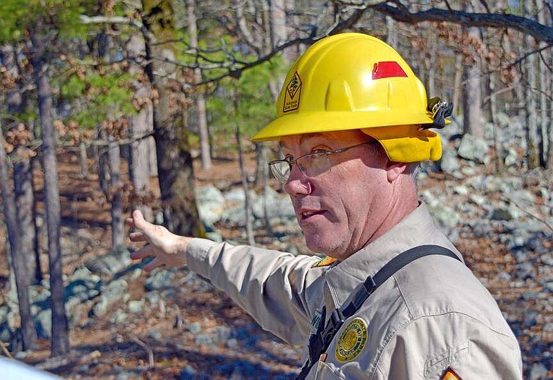 Lake Ouachita State Park Superintendent James Wilborn points out where an AmeriCorps team has been working on the park's Caddo Bend Trail. (The Sentinel-Record/Donald Cross)
