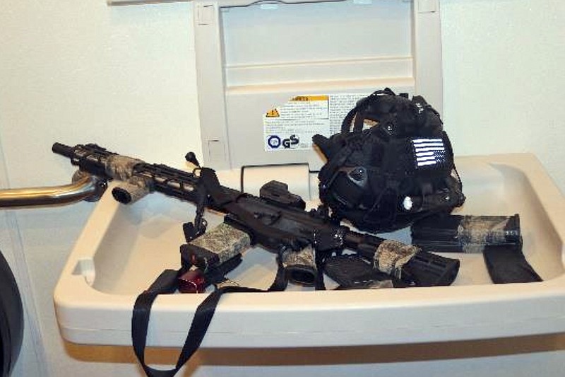 This image provided by the Garfield County, Colo.,  Sheriff's Office shows tactical clothing and weapon belonging to Diego Barajas-Medina, a heavily armed man found dead at a Colorado mountaintop amusement park last year. Barajas-Medina researched mass shootings online but investigators could not find a reason for why he amassed an arsenal or determine why he didn&#x2019;t follow through on &#x201c;whatever he was planning&#x201d;, authorities said Thursday, Feb. 1, 2024.  (Garfield County Sheriff's Office via AP)