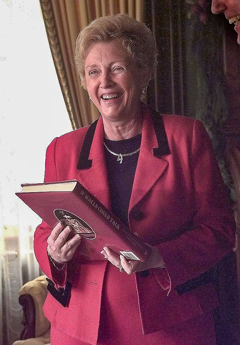 News Tribune file photo: 
Missouri's first lady, Jean Carnahan, is all smiles as she is presented with a copy of her new book "If Walls Could Talk" on Dec. 8, 1998, inside the Governor's Mansion in Jefferson City.