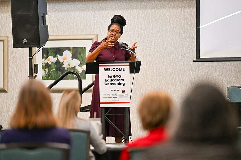 Dr. Conra D. Gist gives a speech at the Grow Your Own Educators Convening on Monday at the Hilton Garden Inn in Fayetteville. The University of Arkansas College of Education and Health Professions Department of Curriculum and Instruction hosted a free symposium to create innovative pathways that address teacher shortages called the Grow Your Own Educators Convening. 
(NWA Democrat-Gazette/Caleb Grieger)