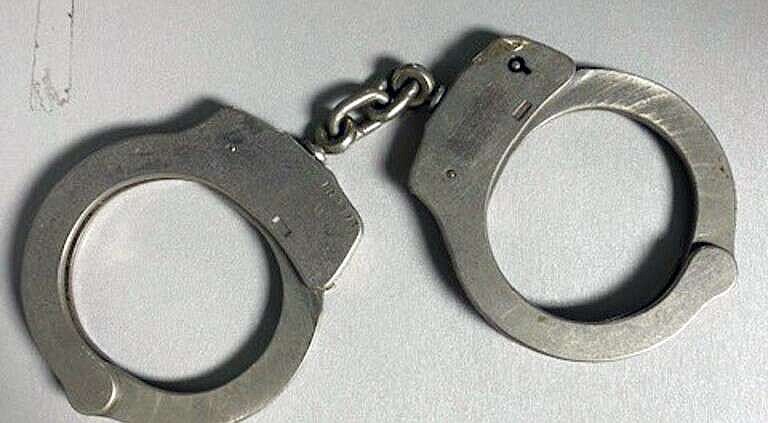 FILE - A pair of handcuffs is shown in this undated file photo.