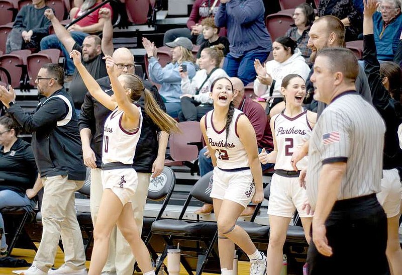 Photo courtesy of Krystal Elmore The Siloam Springs bench celebrates after an overtime win on Feb.6 against Alma.