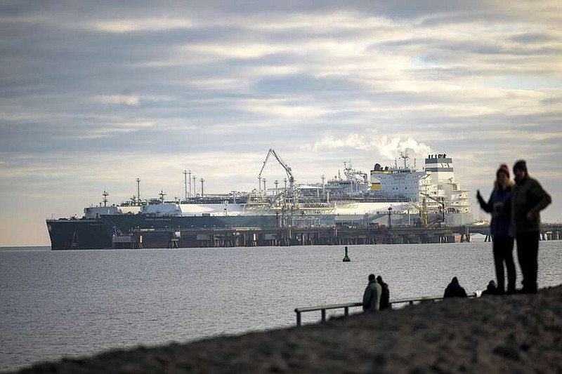 FILE - The tanker Maria Energy, left, loaded with liquefied natural gas, is moored at the floating terminal Hoegh Esperanza, in Wilhelmshaven, Germany, Jan. 3, 2023. Attacks by Yemen's Houthi rebels are posing a new threat to the future of energy supplies to the European Union, which relies on imported oil and natural gas to power factories, generate electricity, run vehicles and more. (Sina Schuldt/dpa via AP, file)g