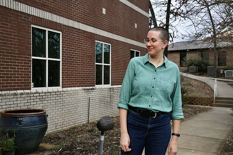 National Park College associate professor of biology Alexandra Barnard is shown in front of the NPC Lab Science building Friday near the location of the new pollinator garden. (The Sentinel-Record/Lance Brownfield)