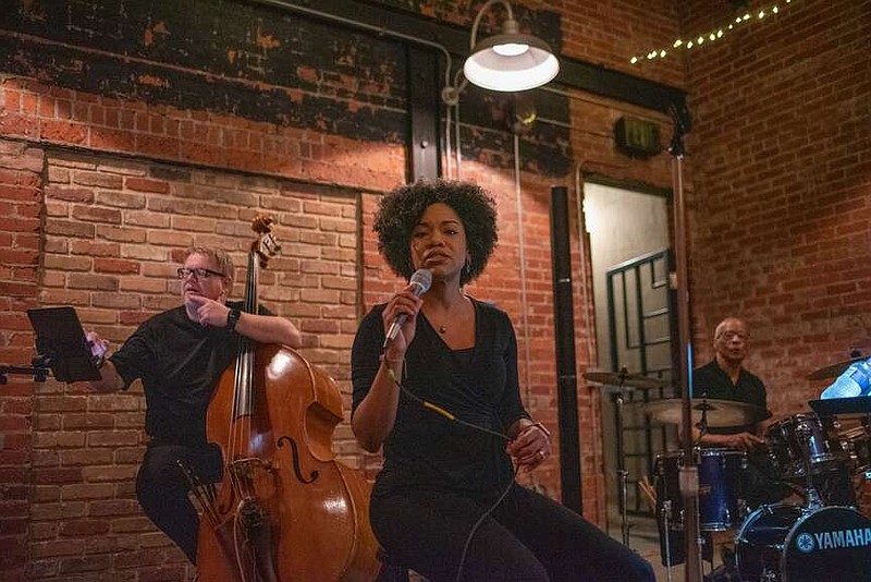 Vocalist Candace Taylor performs during the Wine & Jazz Gala at Silvermoon on Broad in Texarkana, Texas. The annual event is a fundraiser for Harvest Regional Food Bank. The 2024 gala will be March 8 at Silvermoon on Broad. (Staff photo by Erin DeBlanc)