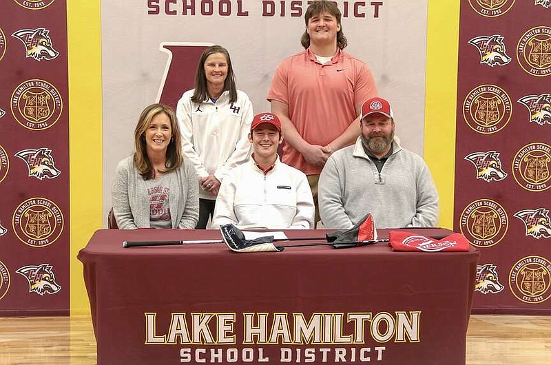 Lake Hamilton senior golfer Brode Horton, center, is pictured with family and friends at Wednesday's signing day at Wolf Arena. (Submitted photo)