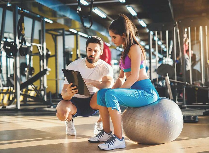 One way to live a healthy, active lifestyle is to consult with a  personal trainer about an exercise plan.