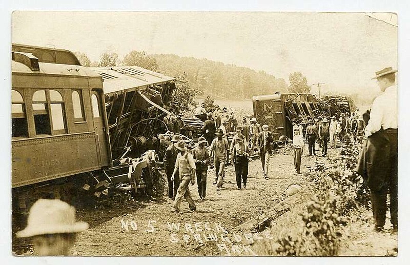 Springdale, 1912: Wednesday's feature showed the wreck of the Frisco train from the front while, this image is further down the train. Per the press, “The mail car, after clearing the embankment, left the tracks, and plunged headlong on top of the earth 40 yards farther, landing badly wrecked in a cornfield.”

Send questions or comments to Arkansas Postcard Past, P.O. Box 2221, Little Rock, AR 72203