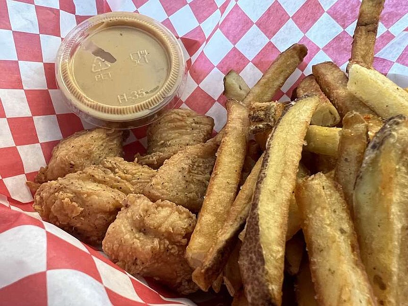 Five white-meat nuggets with fries and some Legacy dipping sauce with a drink costs $5.69 at Jess's Chicken.

(Arkansas Democrat-Gazette/Eric E. Harrison)