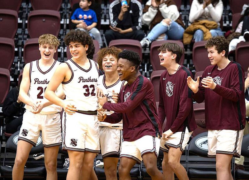 Photograph courtesy of Krystal Elmore The Siloam Springs bench celebrates as the Panthers win their first 5A-West Conference game of the year against Greenwood on Feb. 13.