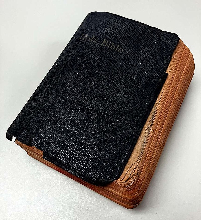 Randy Moll/Westside Eagle Observer
This old Bible was found inside the wall of the old intermediate school, which was demolished in 2017. If anyone knows the rightful owner or how it ended up inside the wall, the Eagle Observer and the Gentry School District would like to know.