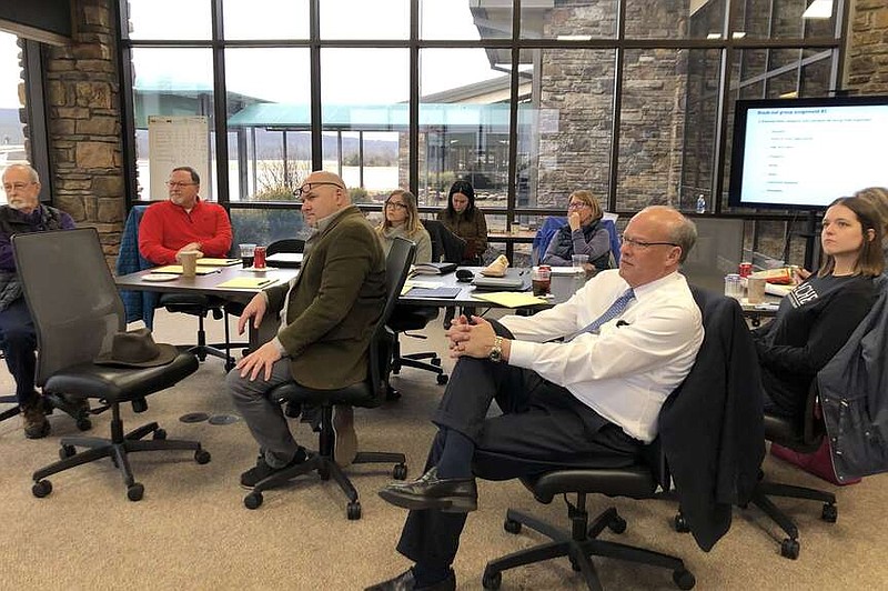 Members of the Fayetteville City Council and Mayor Lioneld Jordan participate in a workshop held Friday at Drake Field in Fayetteville. The council discussed a number of quality of life issues.
(NWA Democrat-Gazette/Stacy Ryburn)