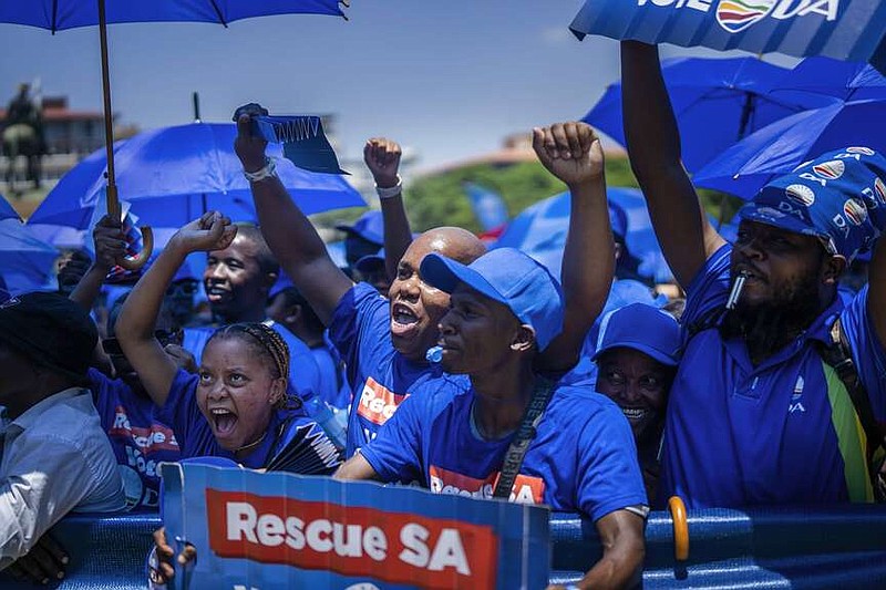 South African sympathisers of the Democratic Alliance opposition party gather in Pretoria, South Africa, Saturday, Feb. 17, 2024, for their national manifesto launch in anticipation of the 2024 general elections. (AP Photo/Jerome Delay)