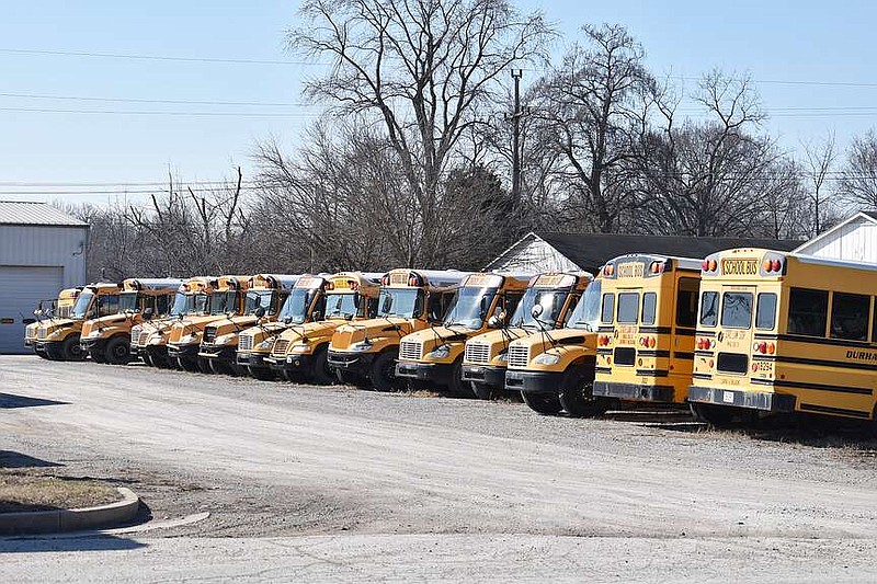 Democrat photo/Garrett Fuller — School buses are seen Tuesday parked outside Durham School Services of Central Missouri's bus depot at East Buchanan Street and Russellville Road. California R-I School District passed up more than $165,000 in savings for the next five years by deciding to continue its relationship with First Student, who has been serving the district since acquiring Apple Bus in February 2022, rather than switching back to Durham. California R-I Superintendent Daniel Williams explained the decision was about more than the cost as the provider transports the most precious cargo.