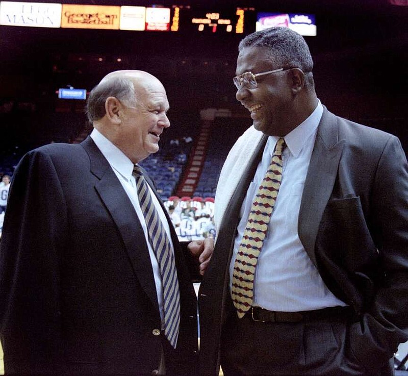 Lefty Driesell, then coaching Georgia State, talks with Georgetown's John Thompson Jr. MUST CREDIT: Rich Lipski/The Washington Post