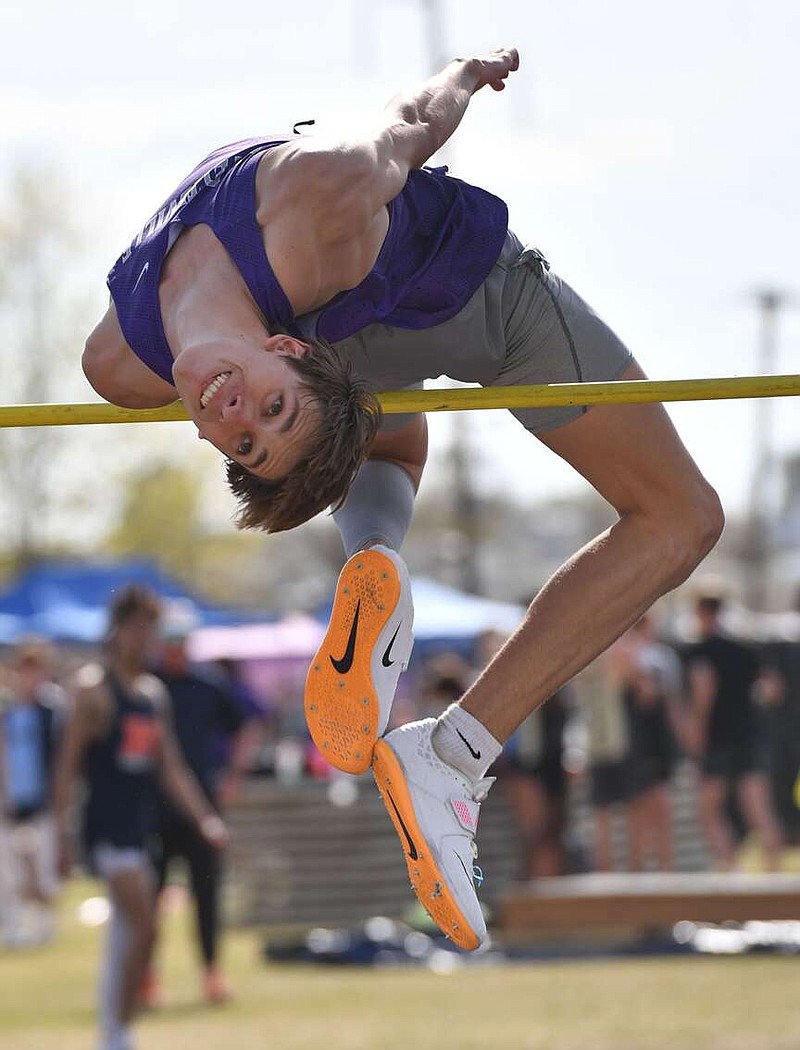 Cooper Williams of Fayetteville competes Thursday April 13, 2023, in the high jump during the Fayetteville Bulldog Relays at Ramay Junior High School in Fayetteville. Williams set a personal best this year by hitting 7 feet in the high jump at the state indoor meet.
(NWA Democrat-Gazette/Andy Shupe)