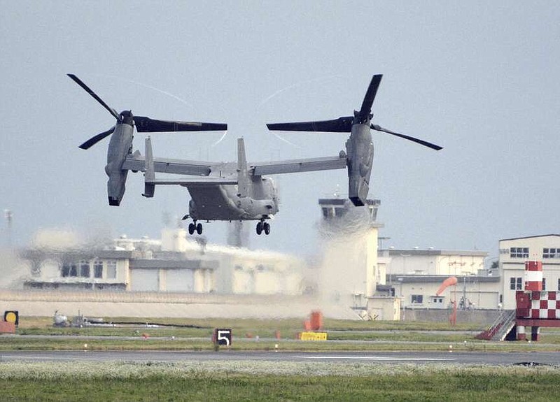 FILE - A U.S. military CV-22 Osprey takes off from Iwakuni base, Yamaguchi prefecture, western Japan, on July 4, 2018. Air Force Special Operations Command said Tuesday it knows what failed on its CV-22B Osprey leading to a November crash in Japan that killed eight service members. But it still does not know why the failure happened. Because of the crash almost the entire Osprey fleet, hundreds of aircraft across the Air Force, Marine Corps and Navy, has been grounded since Dec. 6.  (Kyodo News via AP, File)
