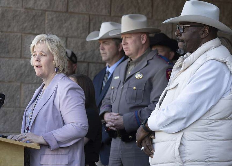 Polk County District Attorney Shelly Sitton, left, speaks alongside Sheriff Byron Lyons, right, as she and other law enforcement officials announce that the body of 11-year-old Audrii Cunningham was found in the Trinity River near her home, Tuesday, Feb. 20, 2024, in Livingston, Texas (Jason Fochtman/Houston Chronicle via AP)