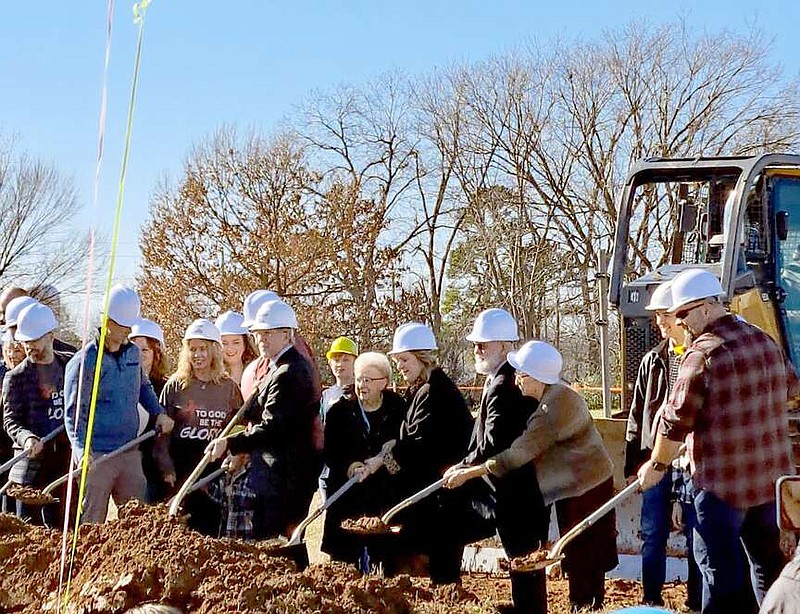 Photo submitted New Life Church's pastoral team breaks ground on a new worship center on Jan. 7. The crowd released balloons and sang together as the pastoral staff turned the first spades of dirt.
