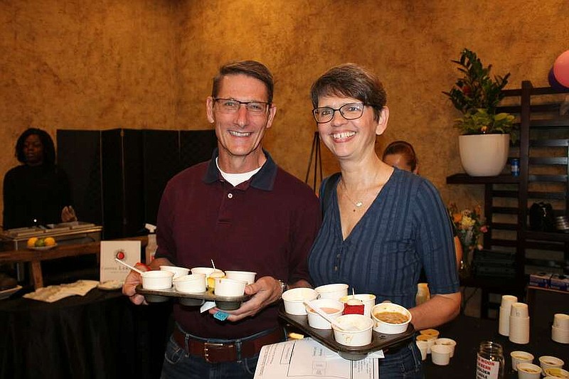 Mark Hagemeir and Terri Beiner loaded up their muffin tins with soup samples at the 2023 Soup Sunday.

(Democrat-Gazette file photo/Rachel O'Neal)