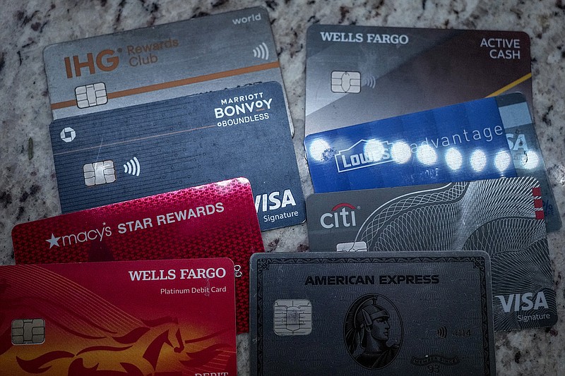 If your family of origin didn't teach you about credit cards, maybe it's because they didn't use them. You may have even been taught that credit cards are dangerous. Now that you're managing your own finances, you're ready for your own credit cards — only you don't really know how to handle them.   (AP Photo/Mike Stewart, Fille)
