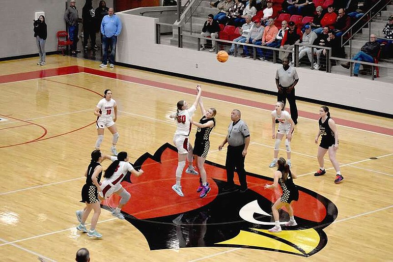 Mark Humphrey/Enterprise-Leader

Farmington junior Kaycee McCumber jumps center as the defending state champions began a quest for a repeat title against Clinton in the Class 4A State quarterfinals Thursday night at Cardinal Arena. The Lady Cardinals won big, 71-32, to advance into Saturday's state semifinals against Nashville.