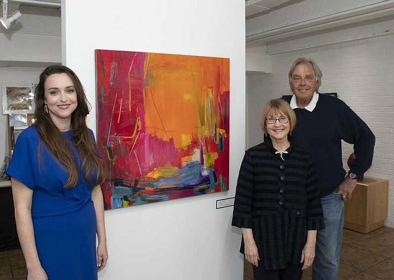 Faye Hedera along with Barbara Satterfield and James Volkert at Central Arkansas Collective art gallery (Arkansas Democrat-Gazette/Cary Jenkins)