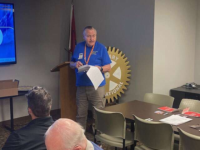 Marc Hayot/Herald-Leader Larry Kenemore, North America Task Force Leader for the Rotary Action Group Addiction Prevention and member of the Siloam Springs Rotary Club delivers a presentation on how to save the life of an overdose victim during the March 19 meeting of the club.