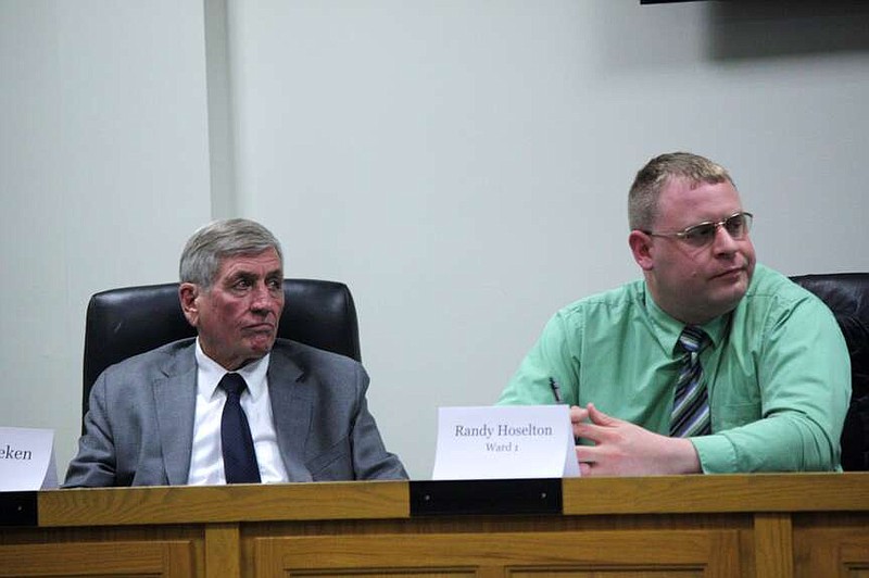 Stephi Smith/News Tribune photo: 
Ward 1 incumbent Jack Deeken, left, and Ward 1 challenger Randy Hoselton listen to another Jefferson City Council candidate answer questions during the News Tribune forum Tuesday evening, March 5, 2024, at City Hall.