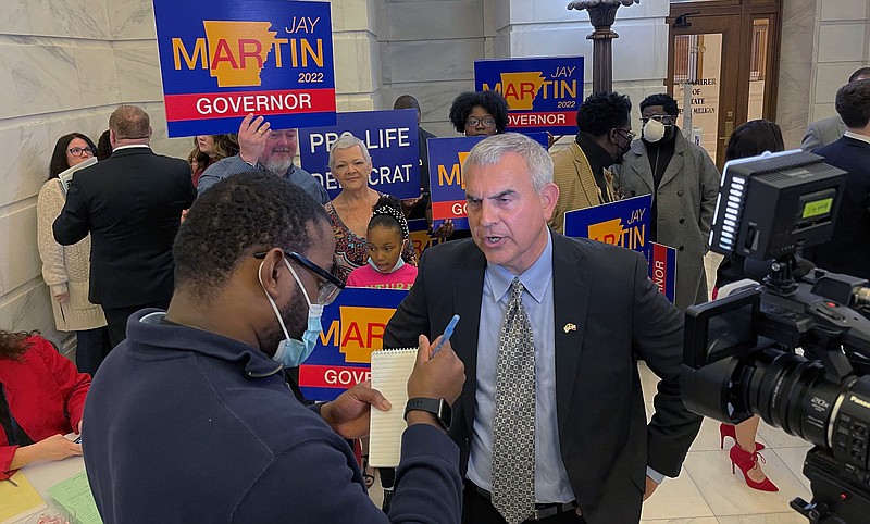 FILE - Jay Martin talks to reporters at the Arkansas state Capitol, Feb. 22, 2022, in Little Rock, Ark. (AP Photo/Andrew DeMillo, File)