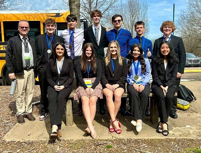 Submitted photo/Gravette School District
Gravette DECA members recently attended and competed in a two-day state DECA Conference. Four students medaled: Shea Jensen and Logan Ehrhart won third place, and Brendan Gebhart won second place, qualifying them for the national competition in California.