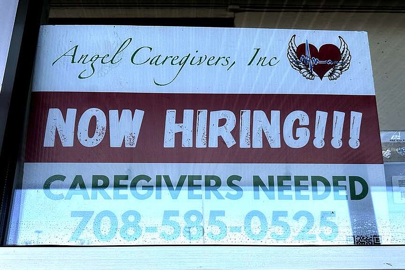 A hiring sign is posted in Niles, Ill., Sunday, March 3, 2024. On Thursday, March 7, 2024, the Labor Department reports on the number of people who applied for unemployment benefits last week. (AP Photo/Nam Y. Huh)