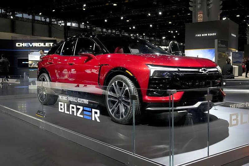 The 2024 Chevrolet Blazer EV sits on display at the Chicago Auto Show, Thursday, Feb. 9, 2023, in Chicago. General Motors said Friday, March 8, 2024, that it is resuming sales of its electric Chevrolet Blazer after software issues forced the automaker to halt sales in December. (AP Photo/Charles Rex Arbogast)