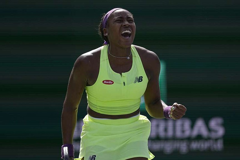Coco Gauff, of the United States, celebrates after defeating Clara Burel, of France, at the BNP Paribas Open tennis tournament, Saturday, March 9, 2024, in Indian Wells, Calif. (AP Photo/Mark J. Terrill)
