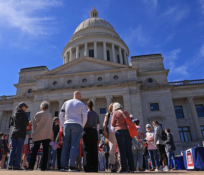 A large group of people gather for a reproductive rights rally on the steps of the Arkansas state Capitol on Sunday, March 10, 2024. (Arkansas Democrat-Gazette/Colin Murphey)