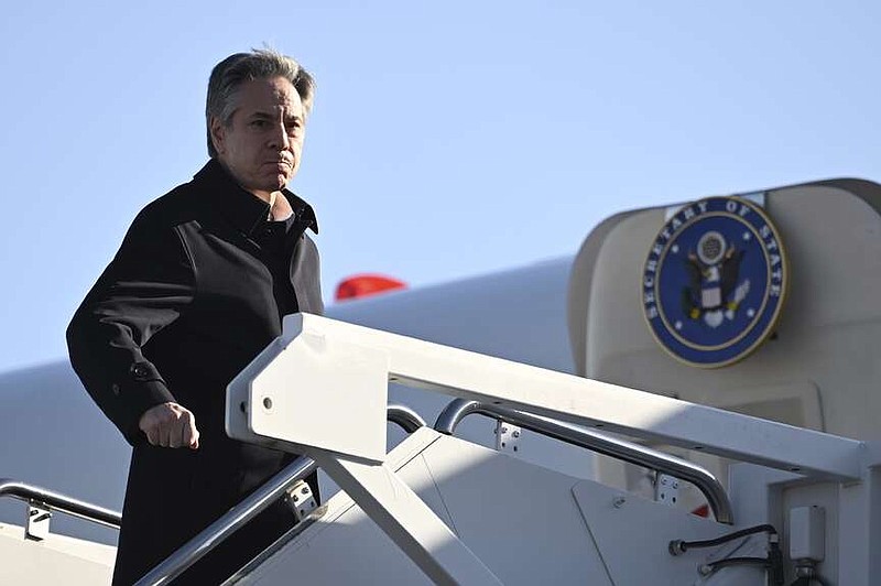 Secretary of State Antony Blinken boards a plane, Monday, March 11, 2024, at Andrews Air Force Base, Md., en route to Kingston, Jamaica for emergency talks with Caribbean leaders on Haiti's crisis. (Andrew Caballero-Reynolds/Pool via AP)