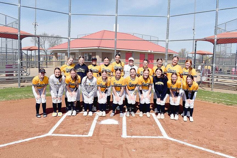 Mark Humphrey/Enterprise-Leader

Prairie Grove's softball team poses during a break in the action while competing in the Farmington Invitational Tournament the weekend before spring break. The Lady Tigers are coached by Dave Torres, Katy Chavis and Beau Collins.