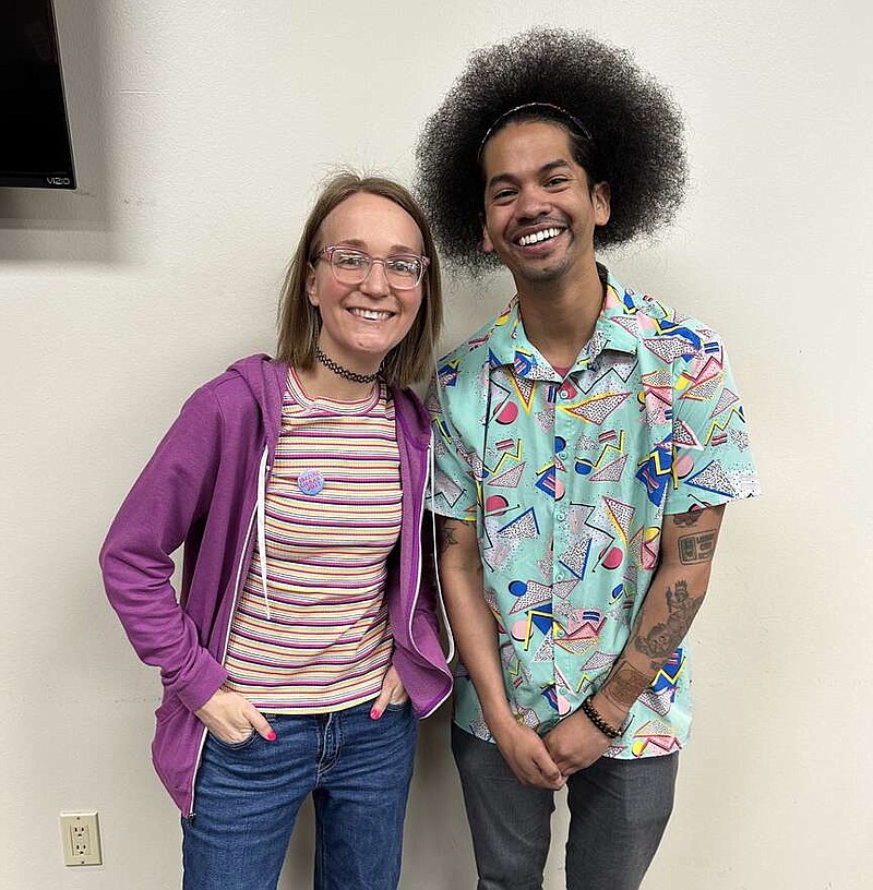 Mychal Threets, "Mychal the Librarian," is shown with Katie Allen, Garland County Library children's librarian, on March 8. (Submitted photo)