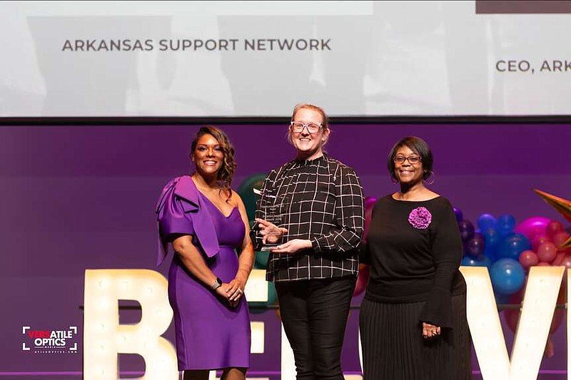 The Arkansas Support Network received the Organization of the Year "Salute to Greatness" award from the Northwest Arkansas MLK Jr. Council recently. ASN received this honor at the Council's 2024 Martin Luther King Jr. Recommittment Celebration. CEO Syard Evans (center) accepted the award.
(Courtesy Photo)