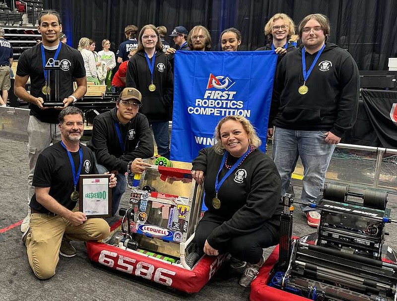 The Tuskin' Raiders, Arkansas High School's robotics team, pose for a photo after their third consecutive win at the FIRST Robotics Competition's regional level, securing an invitation to the Global Championships in Houston. Pictured are, back row, from left, Elias Browning, Hayden Kisselburg, Caleb Kisselburg, Leyla Sozen, Gavin Nalepa and Josh Sano; front row, from left, co-sponsor Chris Brisco, Michael Forehand and co-sponsor Laila Miller. (Photo courtesy of Texarkana Arkansas School District)