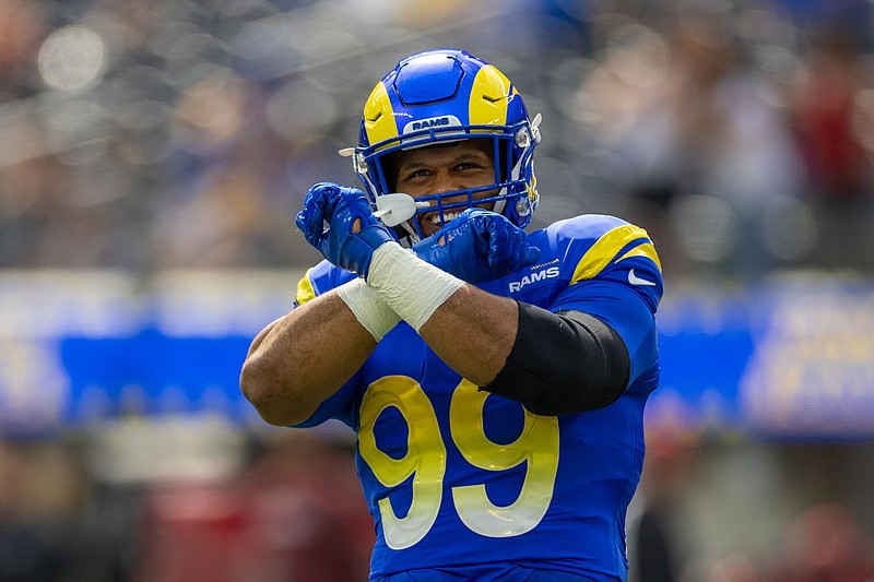 Los Angeles Rams defensive tackle Aaron Donald (99) gestures to fans during pregame warmups before taking on the Arizona Cardinals at SoFi Stadium on Sunday, Oct. 15, 2023 in Inglewood, California. (Robert Gauthier/Los Angeles Times/TNS)