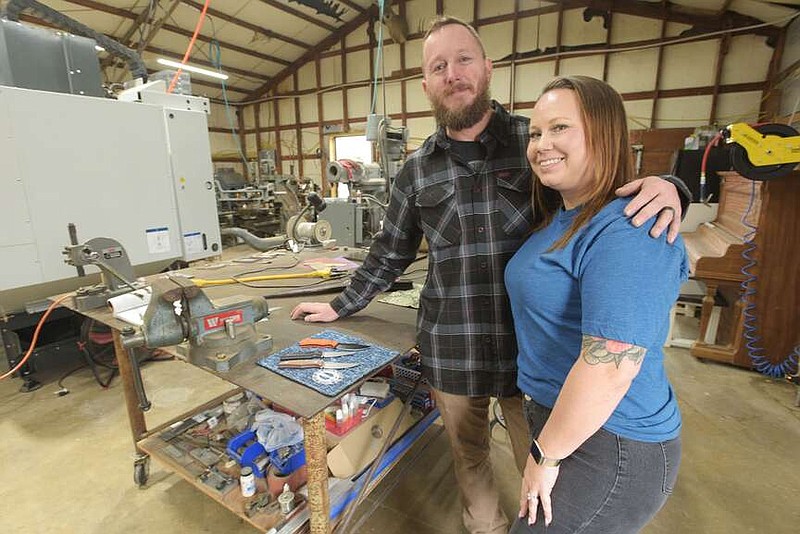 Chris and Mandi Taylor are a husband and wife knife-making team at Taylor Made Knives in Springtown.
(NWA Democrat-Gazette/Flip Putthoff)