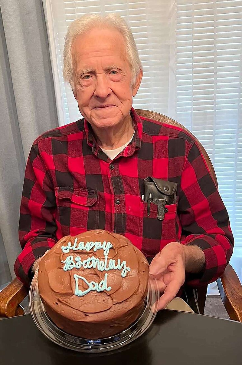 Orvis McRae shows off the cake made for his 90th birthday celebration Sunday, Feb. 18, 2024, at Echo Hills Missionary Baptist Church in Texarkana, Texas. McRae recently reminisced about his decades-long experience as a local country and gospel singer. (Submitted photo)